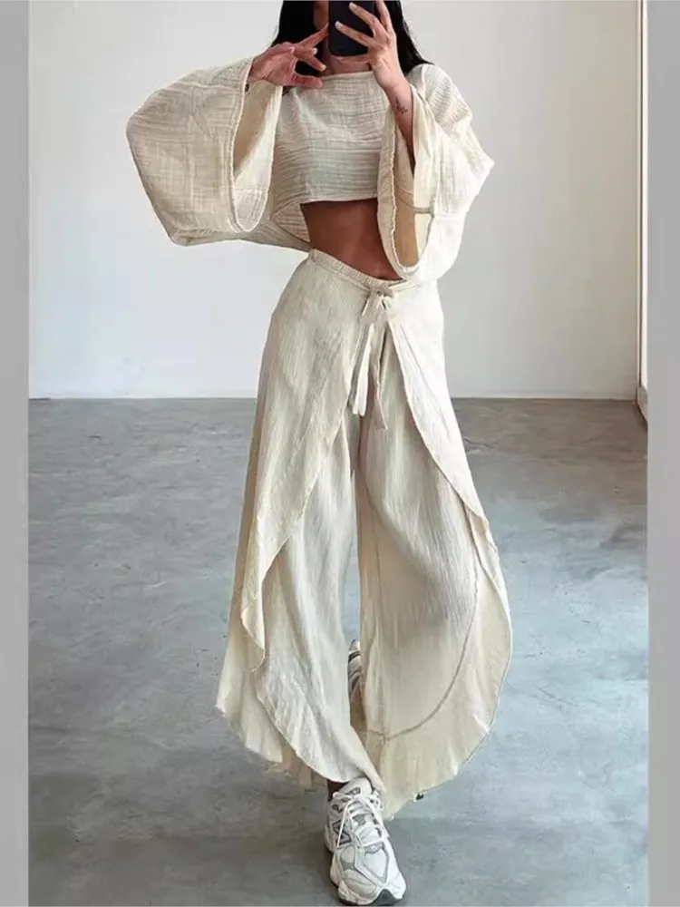 Fashionable Loose Long-sleeved Open-waisted Top Tie Irregular Trousers Two-piece Set Women's Summer Street Style Trousers Set
Fashionable Loose Long-sleeved Open-waisted Top Tie Irregular Trousers Two-piece Set Women's Summer Street Style Trousers Set