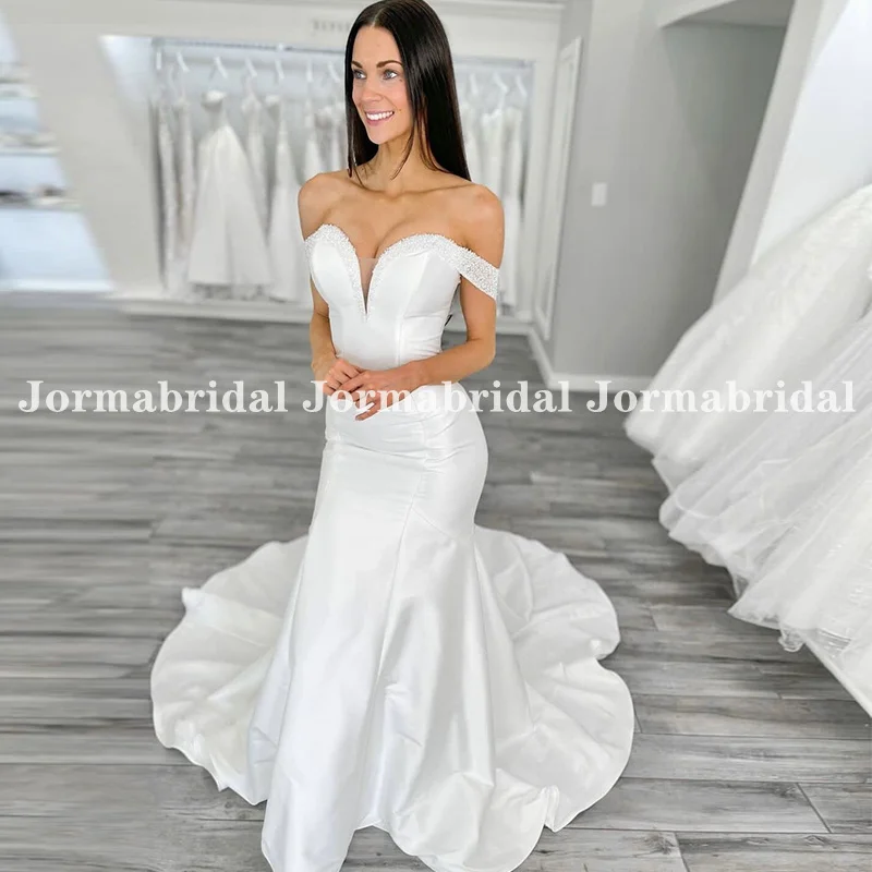 White Satin Trumpet Wedding Dresses Beaded Off the Shoulder Buttons Back Mermaid Bridal Gowns Simple Long Train Vestidos 2023
White Satin Trumpet Wedding Dresses Beaded Off the Shoulder Buttons Back Mermaid Bridal Gowns Simple Long Train Vestidos 2023