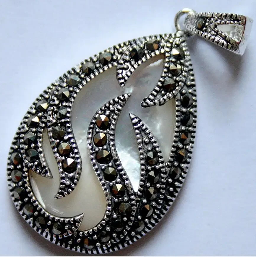 925 Sterling Silver Natural White Shell Inlay Marcasite Teardrop Pendant 30x20MM gem
925 Sterling Silver Natural White Shell Inlay Marcasite Teardrop Pendant 30x20MM gem