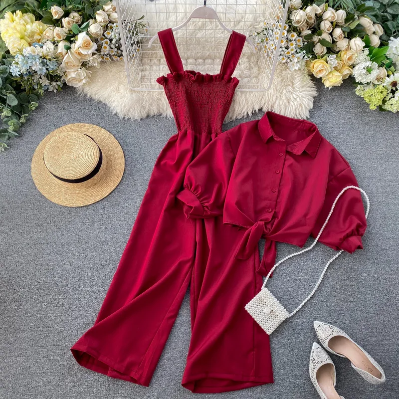 Holiday Style Two-piece Set New Suspender Pleated Wide-leg Jumpsuit + Stand-up Collar Short-sleeved Cardigan Shirt Female Tide
Holiday Style Two-piece Set New Suspender Pleated Wide-leg Jumpsuit + Stand-up Collar Short-sleeved Cardigan Shirt Female Tide
