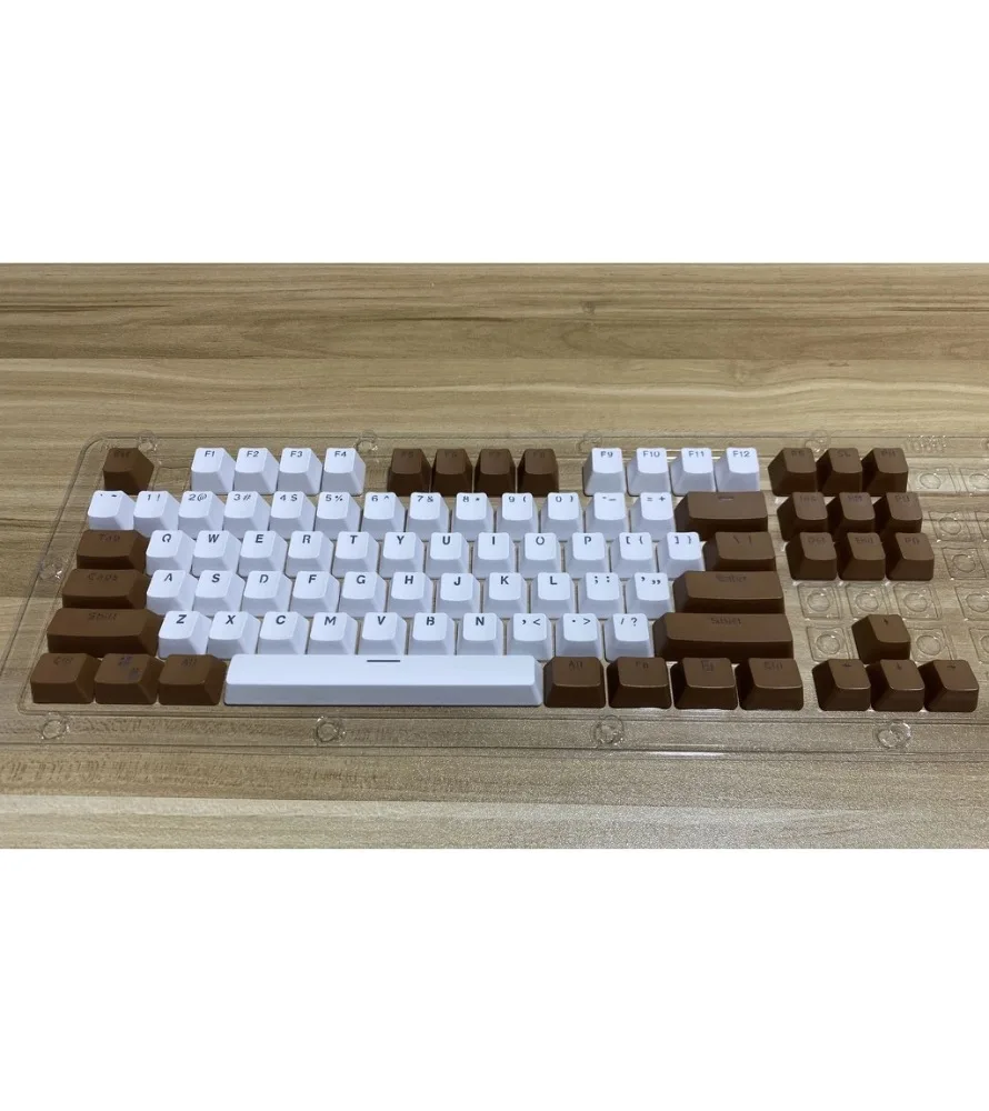 Brown and white PBT double color keycap OEM height character light transmission suitable for 61/87/104 keyboard
Brown and white PBT double color keycap OEM height character light transmission suitable for 61/87/104 keyboard