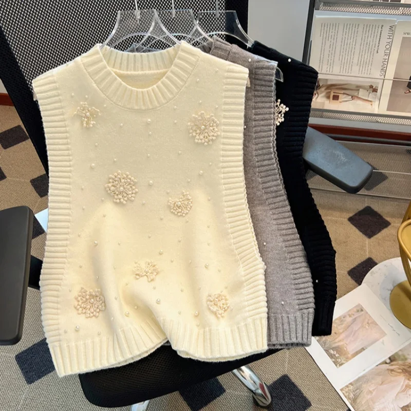 2025 New Spring Fashion Beaded Flower Knitted Vest Women's Korean High Quality O-Collar Loose Sleeveless Sweater Top Female
2025 New Spring Fashion Beaded Flower Knitted Vest Women's Korean High Quality O-Collar Loose Sleeveless Sweater Top Female