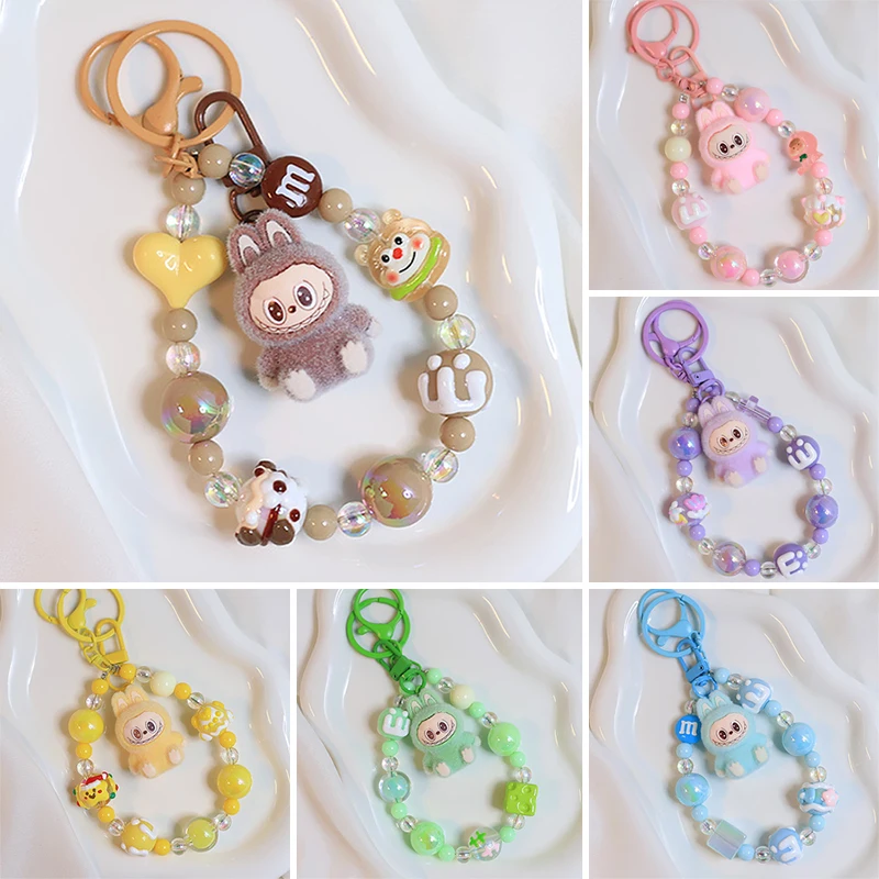 Labubu Keychain Flocking Doll Hand-Painted Beaded Cute Backpack Pendant Monsters Doll Car Keychain Charm Keyring Festivals Gifts
Labubu Keychain Flocking Doll Hand-Painted Beaded Cute Backpack Pendant Monsters Doll Car Keychain Charm Keyring Festivals Gifts