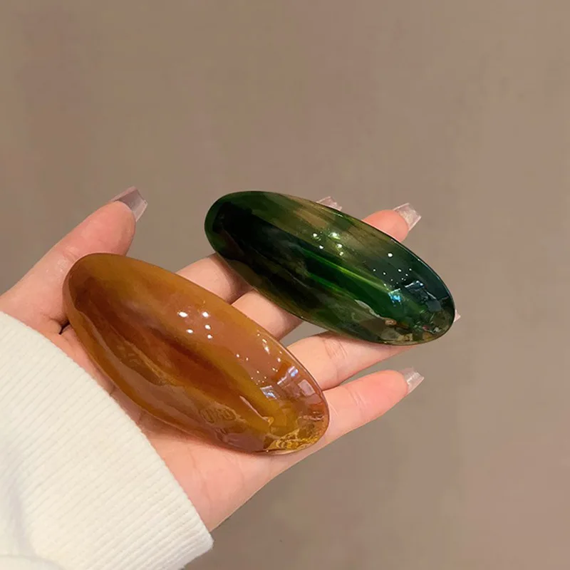 Korean Internet celebrity semi-tie ponytail premium spring clip acetic acid plate floral texture simple back head hair clip
Korean Internet celebrity semi-tie ponytail premium spring clip acetic acid plate floral texture simple back head hair clip