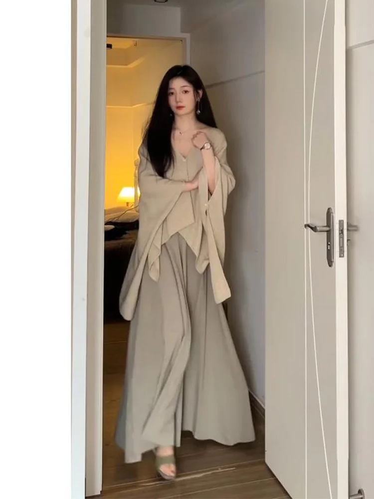 Laid-back Chic Loose Batwing Sleeve Knitted Top Inner Wear Strap Dress Pure Desire Two-piece Set Autumn Fashion Women's Ensemble
Laid-back Chic Loose Batwing Sleeve Knitted Top Inner Wear Strap Dress Pure Desire Two-piece Set Autumn Fashion Women's Ensemble