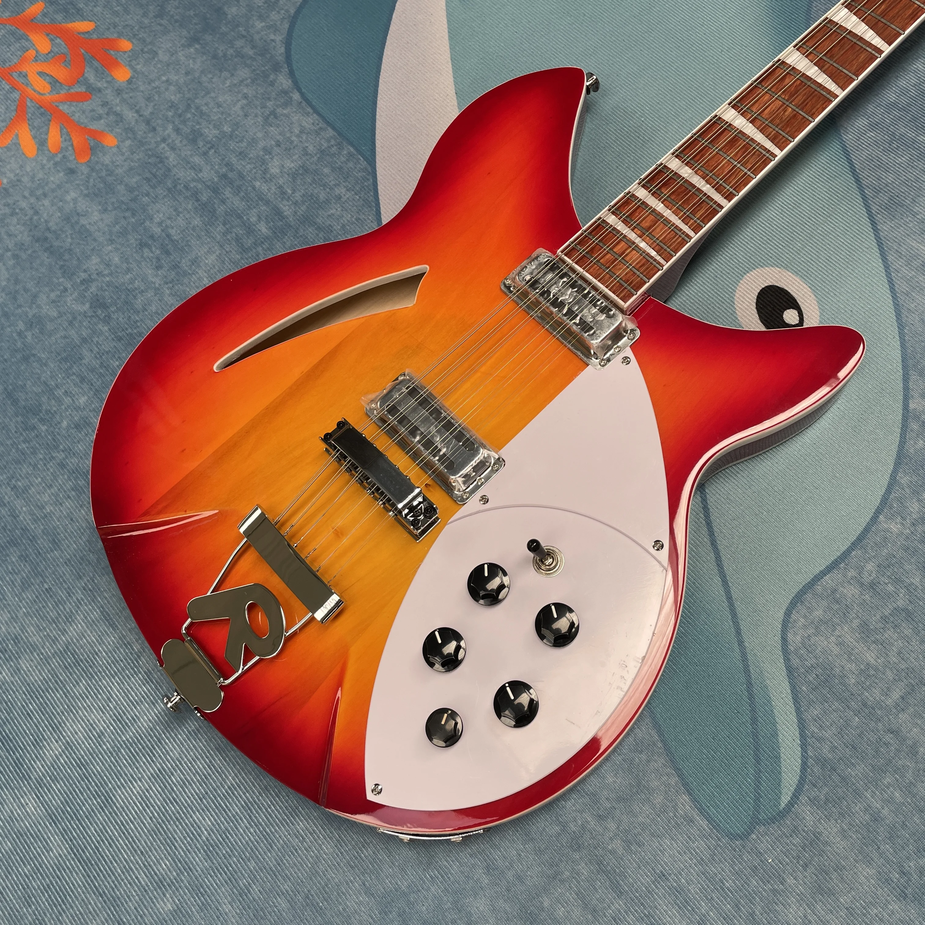 12-string electricguitar rosewood fingerboard,triangular inlays and silver hardwareguitars ideal for stage performances guitarra
12-string electricguitar rosewood fingerboard,triangular inlays and silver hardwareguitars ideal for stage performances guitarra
