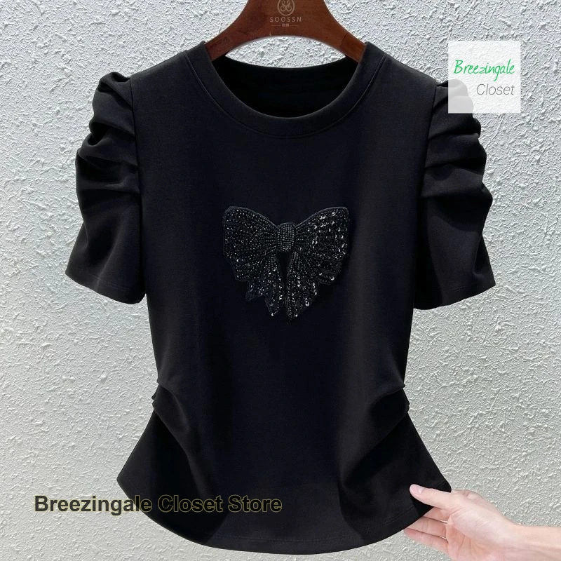 French fashion bow bubble sleeve T-shirt women's new summer temperament design feels slim and versatile casual top.
French fashion bow bubble sleeve T-shirt women's new summer temperament design feels slim and versatile casual top.