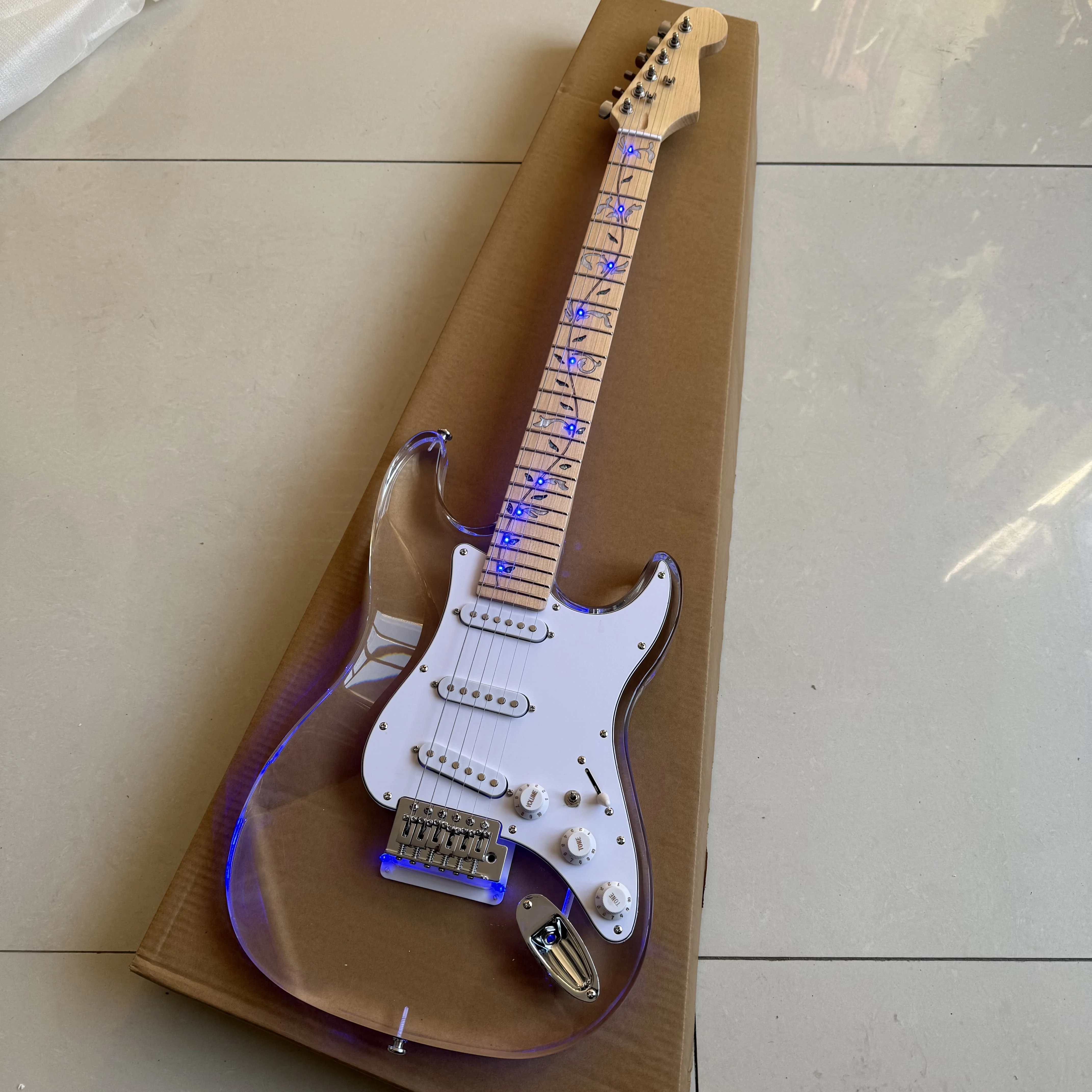 Factory direct sales of acrylic guitar body, maple neck, Tree of Life inlay with LED lights, electric guitar GT-001
Factory direct sales of acrylic guitar body, maple neck, Tree of Life inlay with LED lights, electric guitar GT-001