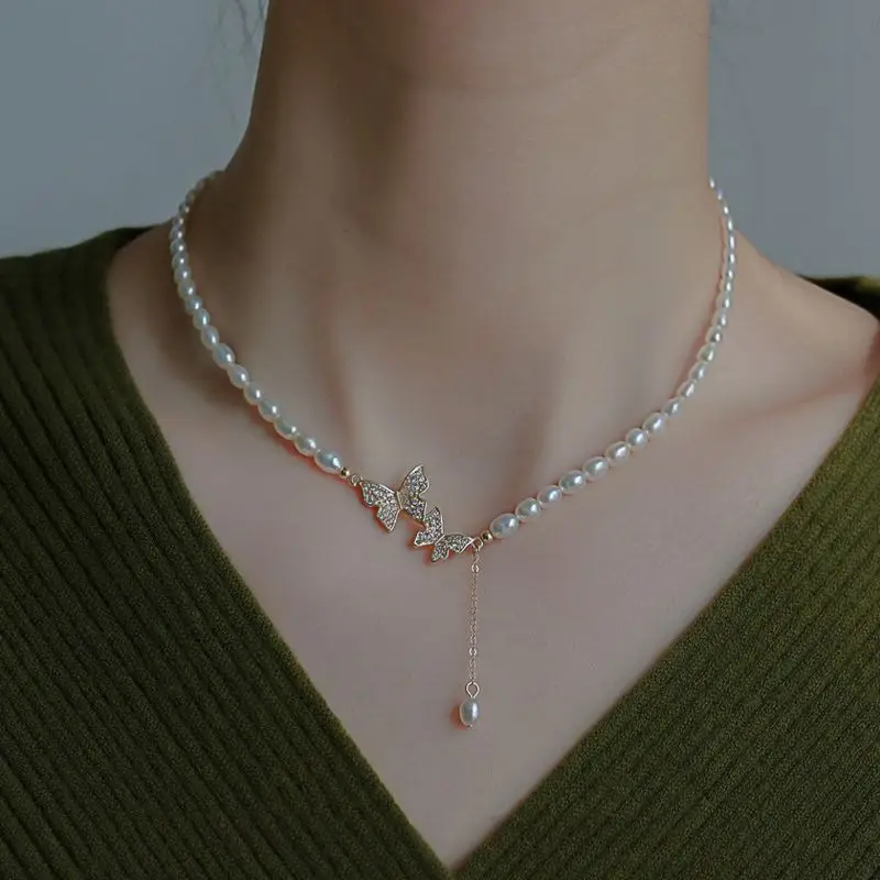 Strong Light Rice Grain Freshwater Pearl Necklace Women's Real Gold Electroplated Micro-Inlaid One-Piece Butterfly Clavicle Chai
Strong Light Rice Grain Freshwater Pearl Necklace Women's Real Gold Electroplated Micro-Inlaid One-Piece Butterfly Clavicle Chai