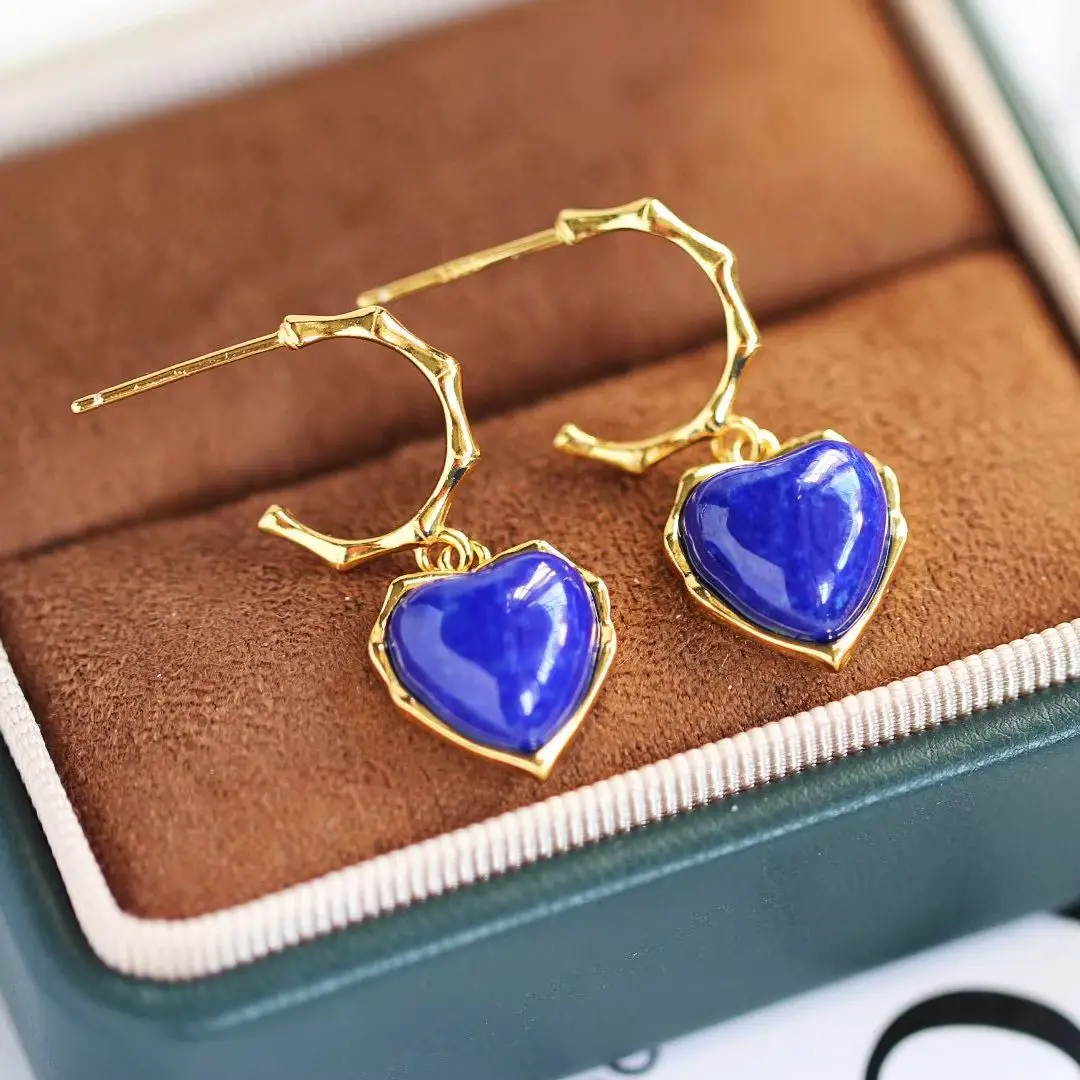 Luxurious 925 sterling silver. Natural lapis lazuli, heart-shaped earrings for women. Glamour jewelry accessories.
Luxurious 925 sterling silver. Natural lapis lazuli, heart-shaped earrings for women. Glamour jewelry accessories.