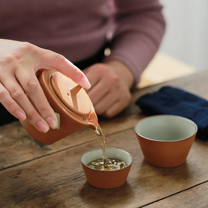 One Pot Two Cups Travel Portable Quick Cup Japanese Ceramic Kung Fu Tea Set Small Set Mini Rough Pottery Outdoor Teapot
One Pot Two Cups Travel Portable Quick Cup Japanese Ceramic Kung Fu Tea Set Small Set Mini Rough Pottery Outdoor Teapot