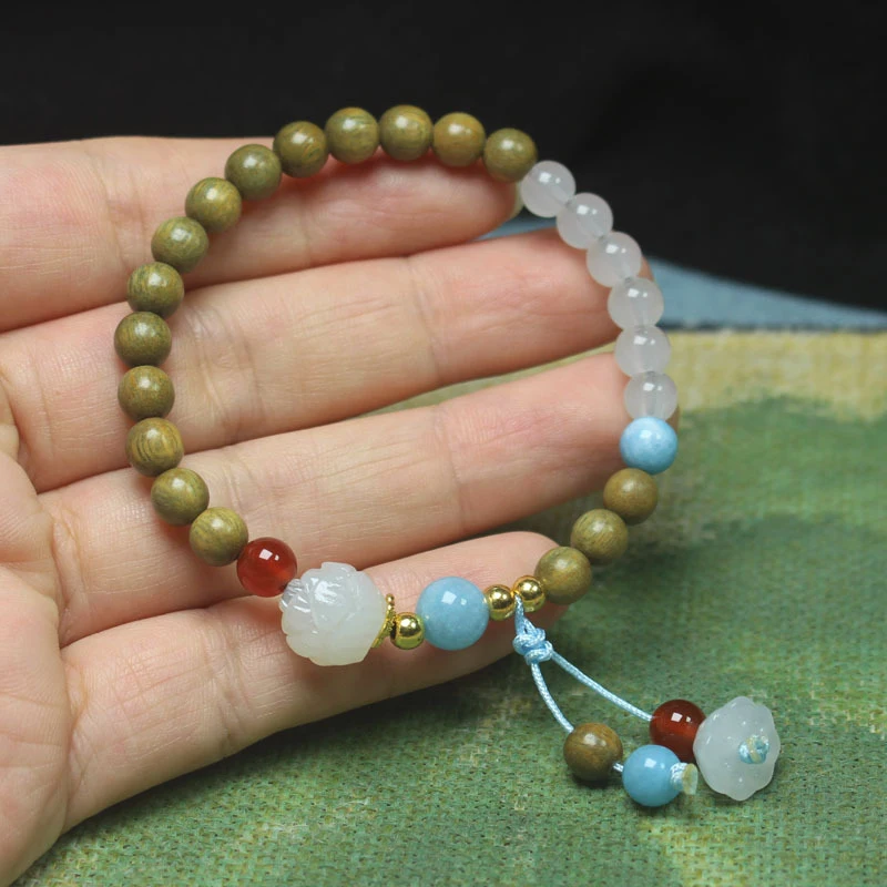 Green Sandalwood 6mm Single-Loop Buddhist with and Lotus Pod Design, Traditional Chinese Style Bead Bracelet
Green Sandalwood 6mm Single-Loop Buddhist with and Lotus Pod Design, Traditional Chinese Style Bead Bracelet