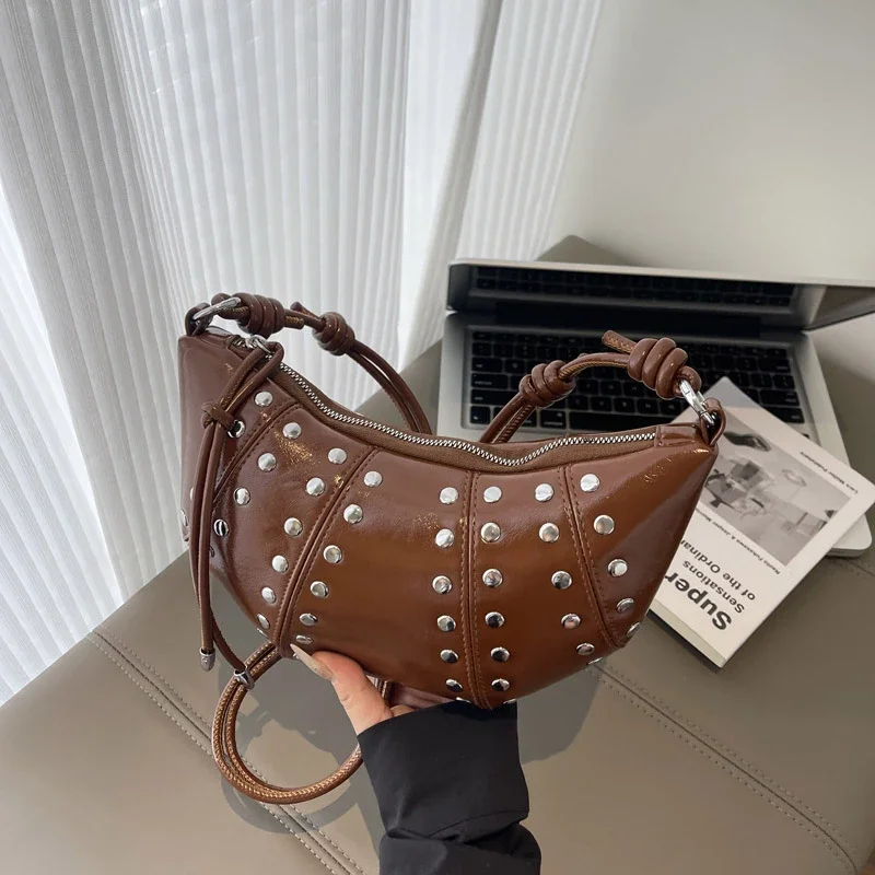 Designer Studded Shoulder Bag Rivet Crescent Bag 2025 New Women Metal Underarm Bag High-end Retro Rivet Polka Dot Crossbody Bags
Designer Studded Shoulder Bag Rivet Crescent Bag 2025 New Women Metal Underarm Bag High-end Retro Rivet Polka Dot Crossbody Bags