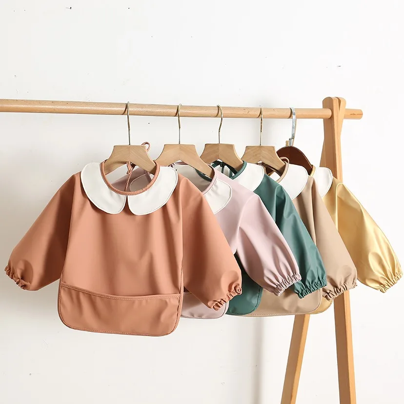 Fashion Baby Bibs Anti-dirty Toddler Reverse Dressing Waterproof Children Feeding Apron Kids PU Meals Bags Long Sleeve
Fashion Baby Bibs Anti-dirty Toddler Reverse Dressing Waterproof Children Feeding Apron Kids PU Meals Bags Long Sleeve