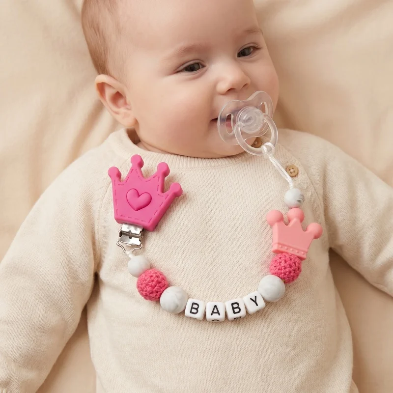 Personalized Baby Pacifier Clip Custom Name Silicone Teether Holder BPA Free Crown Soother Chain Dummy Clip for Newborn Gift
Personalized Baby Pacifier Clip Custom Name Silicone Teether Holder BPA Free Crown Soother Chain Dummy Clip for Newborn Gift