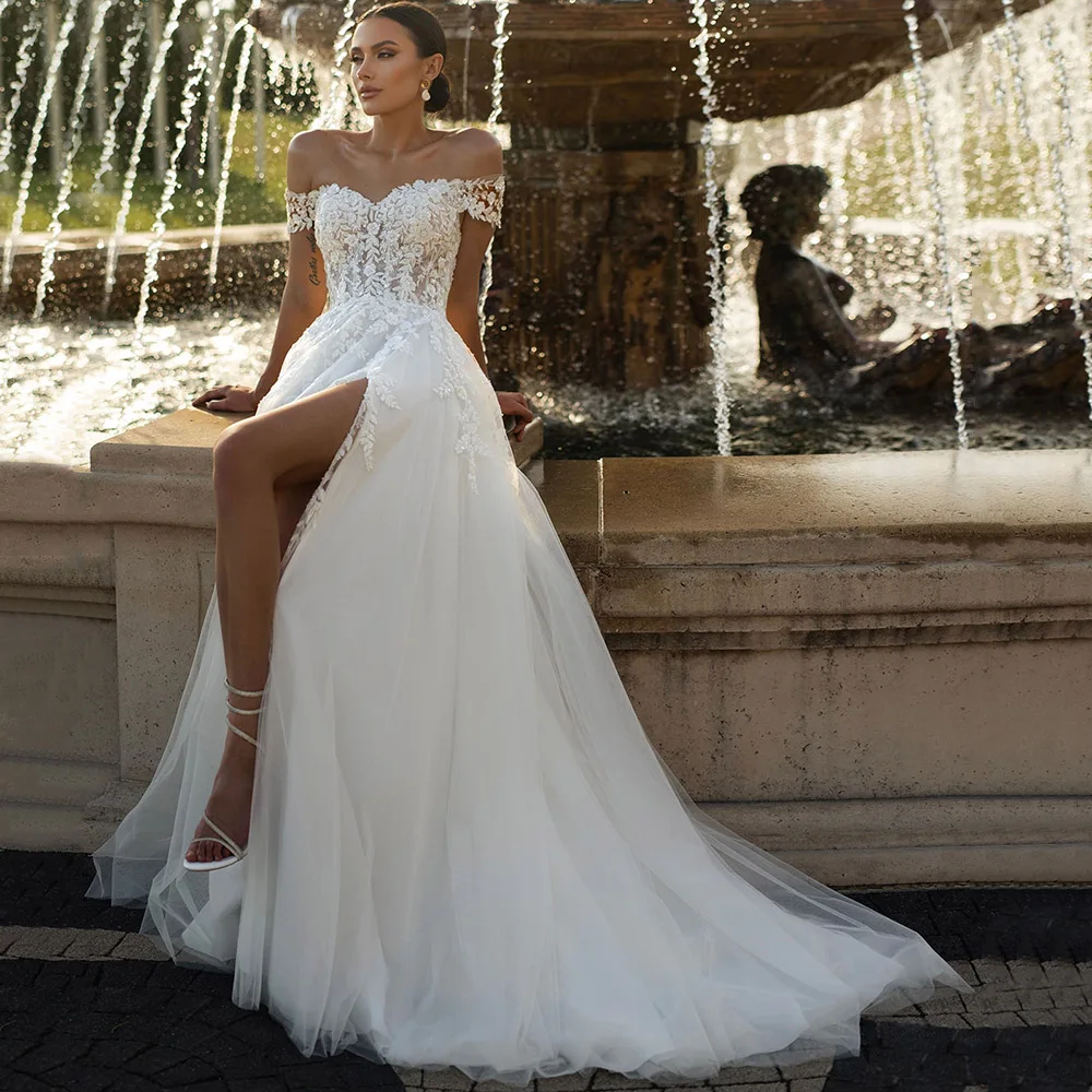 Women Tulle Side Slit Wedding Dress Customized Off the Shoulder Appliques Lace A-Line Sweetheart Bridal Gowns Vestidos De Novia
Women Tulle Side Slit Wedding Dress Customized Off the Shoulder Appliques Lace A-Line Sweetheart Bridal Gowns Vestidos De Novia