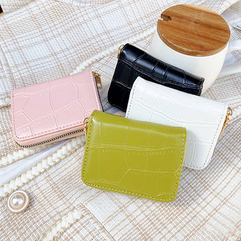The New Korean Version of Women's Small Purse Multi-card Stone Holding Bag Simple Fashion Card Bag
The New Korean Version of Women's Small Purse Multi-card Stone Holding Bag Simple Fashion Card Bag