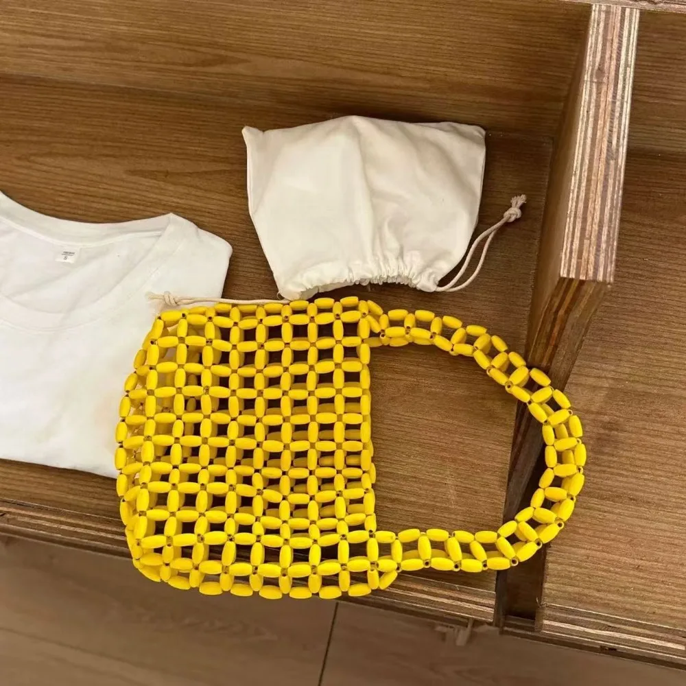 Simple Handmade Beaded Woven Bag Pure Color Vintage Hollow Out Bag Boho Chic Openwork Bag Vacation Beach
Simple Handmade Beaded Woven Bag Pure Color Vintage Hollow Out Bag Boho Chic Openwork Bag Vacation Beach