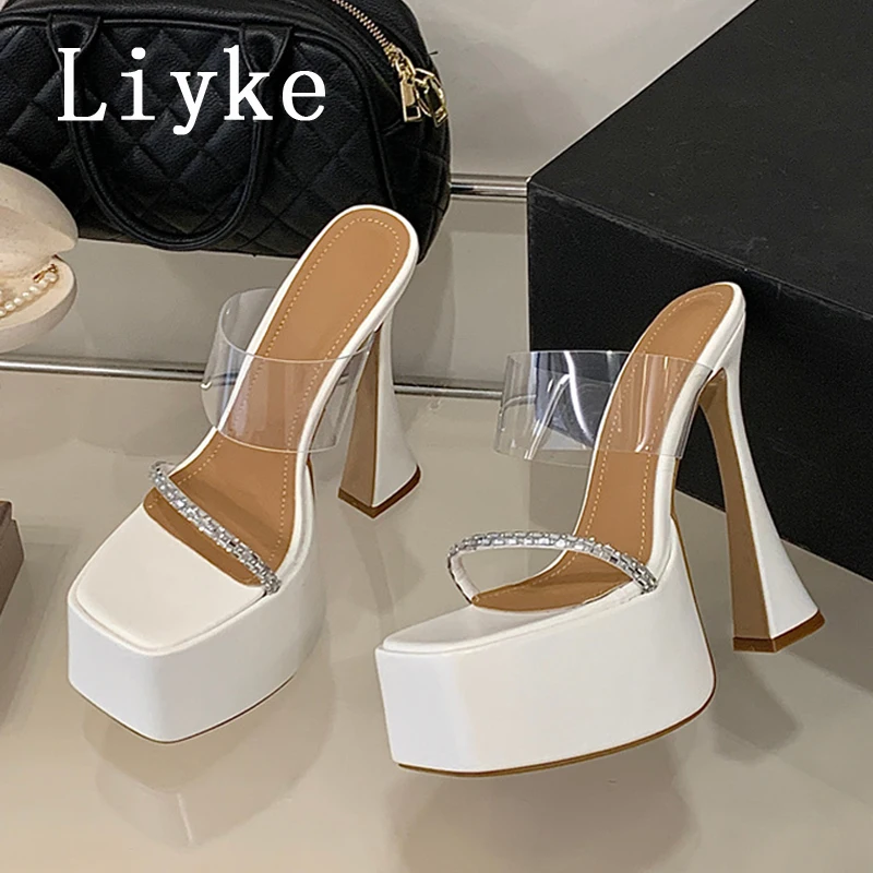 Летние женские шлепанцы Liyke из ПВХ с прозрачным квадратным носком на платформе, модные туфли на толстом высоком каблуке с кристаллами для вечеринок, Zapatos Mujer
Летние женские шлепанцы Liyke из ПВХ с прозрачным квадратным носком на платформе, модные туфли на толстом высоком каблуке с кристаллами для вечеринок, Zapatos Mujer