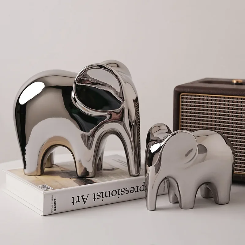 Modern simple ceramic elephant ornaments, living room decorations, light luxury study room TV cabinet bookends
Modern simple ceramic elephant ornaments, living room decorations, light luxury study room TV cabinet bookends