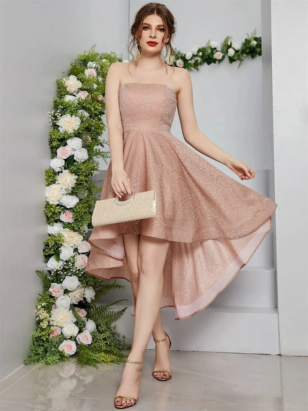 The sleek strapless highlights fine shoulder lines. The dreamy open back shapes charming back views. The full puffy skirt makes
The sleek strapless highlights fine shoulder lines. The dreamy open back shapes charming back views. The full puffy skirt makes