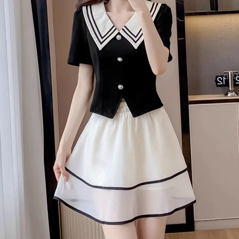 New Summer Fat Mm Fashionable Sweet Age-reducing Small Fragrance Top Temperament Half-body Skirt Two-piece Set Women's Clothing
New Summer Fat Mm Fashionable Sweet Age-reducing Small Fragrance Top Temperament Half-body Skirt Two-piece Set Women's Clothing