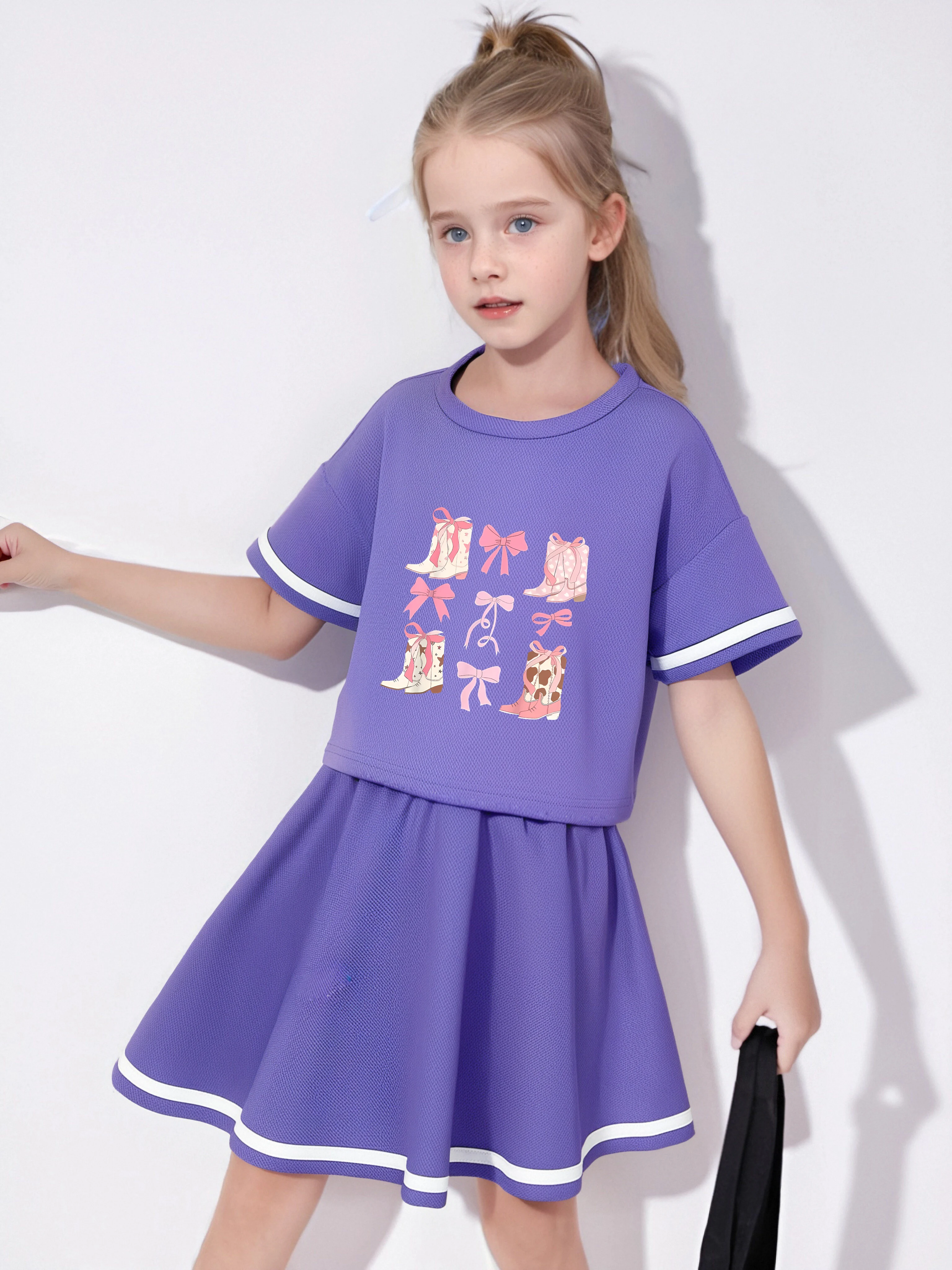 A two-piece set of short sleeved top and pleated skirt for summer girls, featuring a creative bow print pattern for comfort,
A two-piece set of short sleeved top and pleated skirt for summer girls, featuring a creative bow print pattern for comfort,