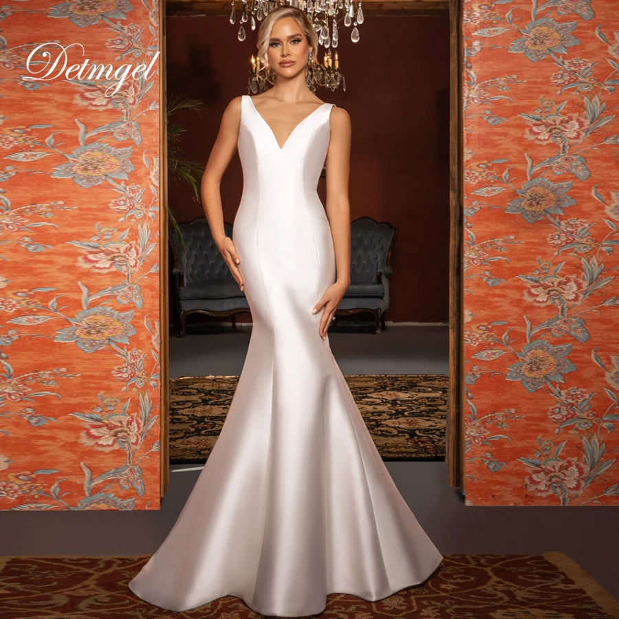 Detmgel New Simple V Neck Mermaid Wedding Dresses Backless Satin Bow Appliques Sleeveless Court Train Bridal Dress Customized
Detmgel New Simple V Neck Mermaid Wedding Dresses Backless Satin Bow Appliques Sleeveless Court Train Bridal Dress Customized