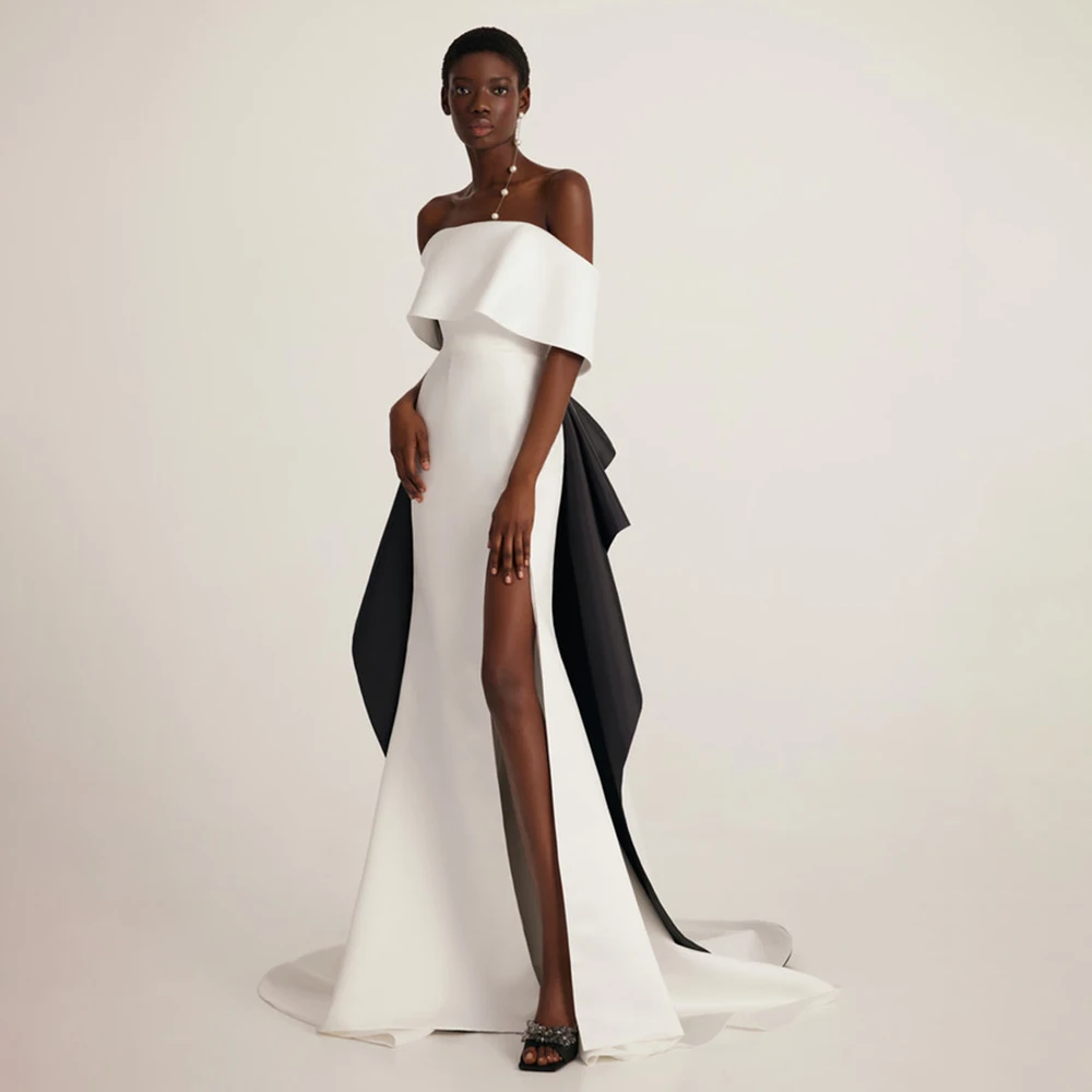 African Wedding Dress Off the Shoulder Trumpet/Mermaid Wedding Gowns with Detachable Train Side Slit Backless Ruffle Bridal Gown
African Wedding Dress Off the Shoulder Trumpet/Mermaid Wedding Gowns with Detachable Train Side Slit Backless Ruffle Bridal Gown