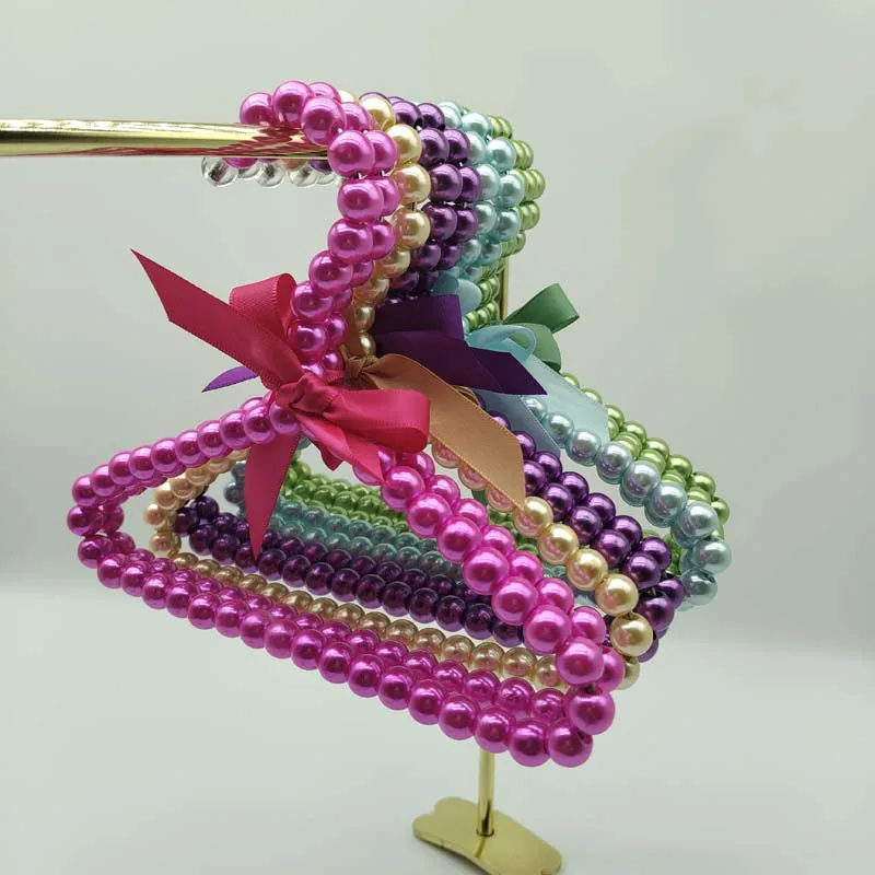 Elegant Pet Dog Pearl Bow Ribbon Clothes Hanger Doll Infant Toddler Kids Closet Storage Rack Space Saving Clothing Organizer
Elegant Pet Dog Pearl Bow Ribbon Clothes Hanger Doll Infant Toddler Kids Closet Storage Rack Space Saving Clothing Organizer