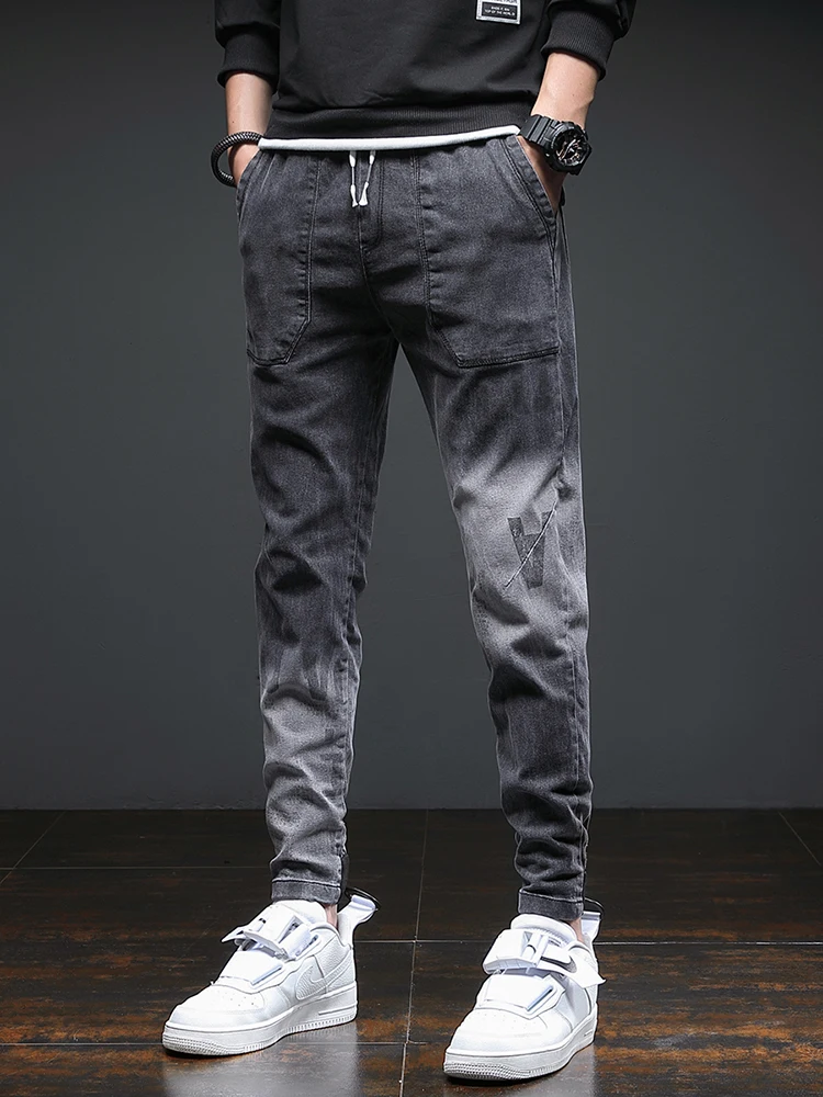 Модные мужские джинсы свободного покроя в стиле Харадзюку, весенне-осенние повседневные свободные брюки с манжетами длиной девяти зубцов, молодежная одежда
Модные мужские джинсы свободного покроя в стиле Харадзюку, весенне-осенние повседневные свободные брюки с манжетами длиной девяти зубцов, молодежная одежда