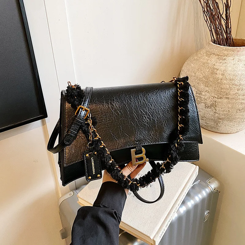 2025 Waxed Leather Tote Bag, Vintage Chain Underarm Purse for Women, Spacious Crossbody Bag, Textured Shoulder Bag
2025 Waxed Leather Tote Bag, Vintage Chain Underarm Purse for Women, Spacious Crossbody Bag, Textured Shoulder Bag