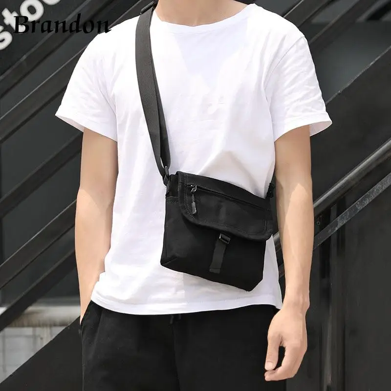 Elegant men's temperament crossbody bag Hong Kong style versatile ins small bag street canvas fashionable casual shoulder bag
Elegant men's temperament crossbody bag Hong Kong style versatile ins small bag street canvas fashionable casual shoulder bag