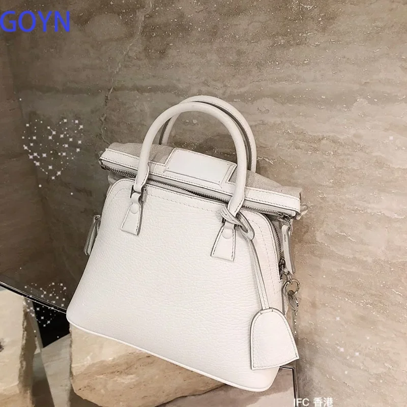 Nordic Simple Cream Pebbled Leather Double Zip Shell Bag Full Zipper Closure Compact Elegant Crossbody Handbag For Bridal Casual Outfits
Nordic Simple Cream Pebbled Leather Double Zip Shell Bag Full Zipper Closure Compact Elegant Crossbody Handbag For Bridal Casual Outfits