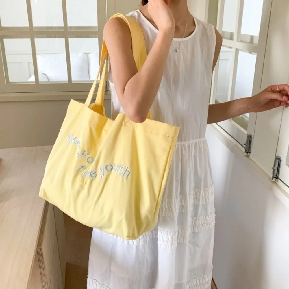 Solid Color Canvas Totes Bag College Student Large Capacity Letters Shoulder Bag Versatile Casual Women's Handbag Shopping
Solid Color Canvas Totes Bag College Student Large Capacity Letters Shoulder Bag Versatile Casual Women's Handbag Shopping