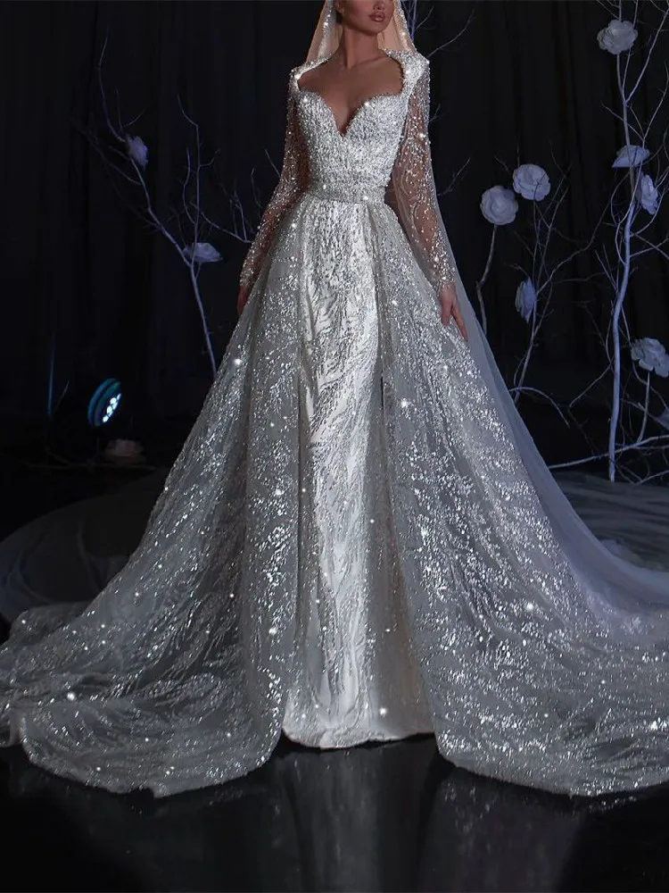 Sparkly Mermaid Wedding Dresses Long Sleeves V Neck Sequins ShinyAppliques Beaded Detachable Train Bridal Gowns Vestina De Novia
Sparkly Mermaid Wedding Dresses Long Sleeves V Neck Sequins ShinyAppliques Beaded Detachable Train Bridal Gowns Vestina De Novia