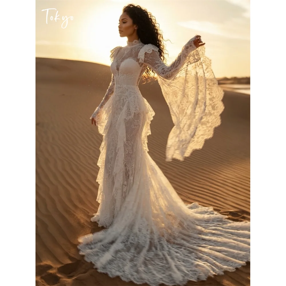 Tokyo Boho Lace Bell Sleeve Wedding Dress Mermaid Ruffle Bridal Gown Vintage Desert Wedding Dress Luxury Outdoor Party Gown 2026
Tokyo Boho Lace Bell Sleeve Wedding Dress Mermaid Ruffle Bridal Gown Vintage Desert Wedding Dress Luxury Outdoor Party Gown 2026