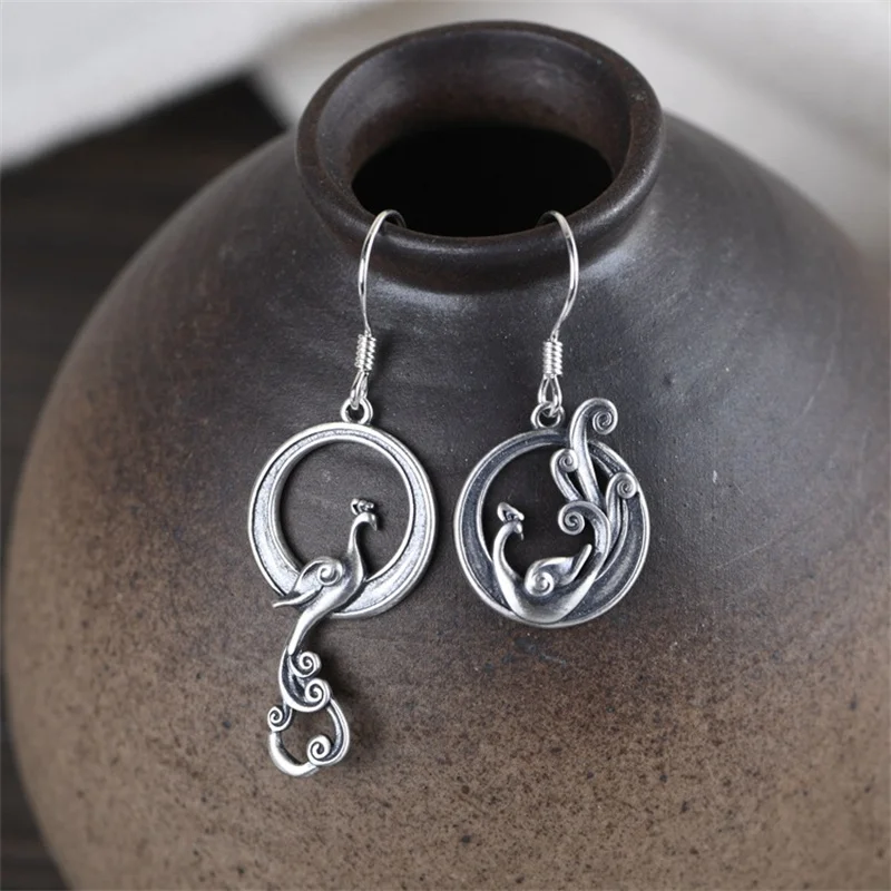 Thai Silver Asymmetric Phoenix Earrings for Women 925 Sterling Silver Circles Dangle Earrings Creative Peacock Animals Jewelry 
Thai Silver Asymmetric Phoenix Earrings for Women 925 Sterling Silver Circles Dangle Earrings Creative Peacock Animals Jewelry
