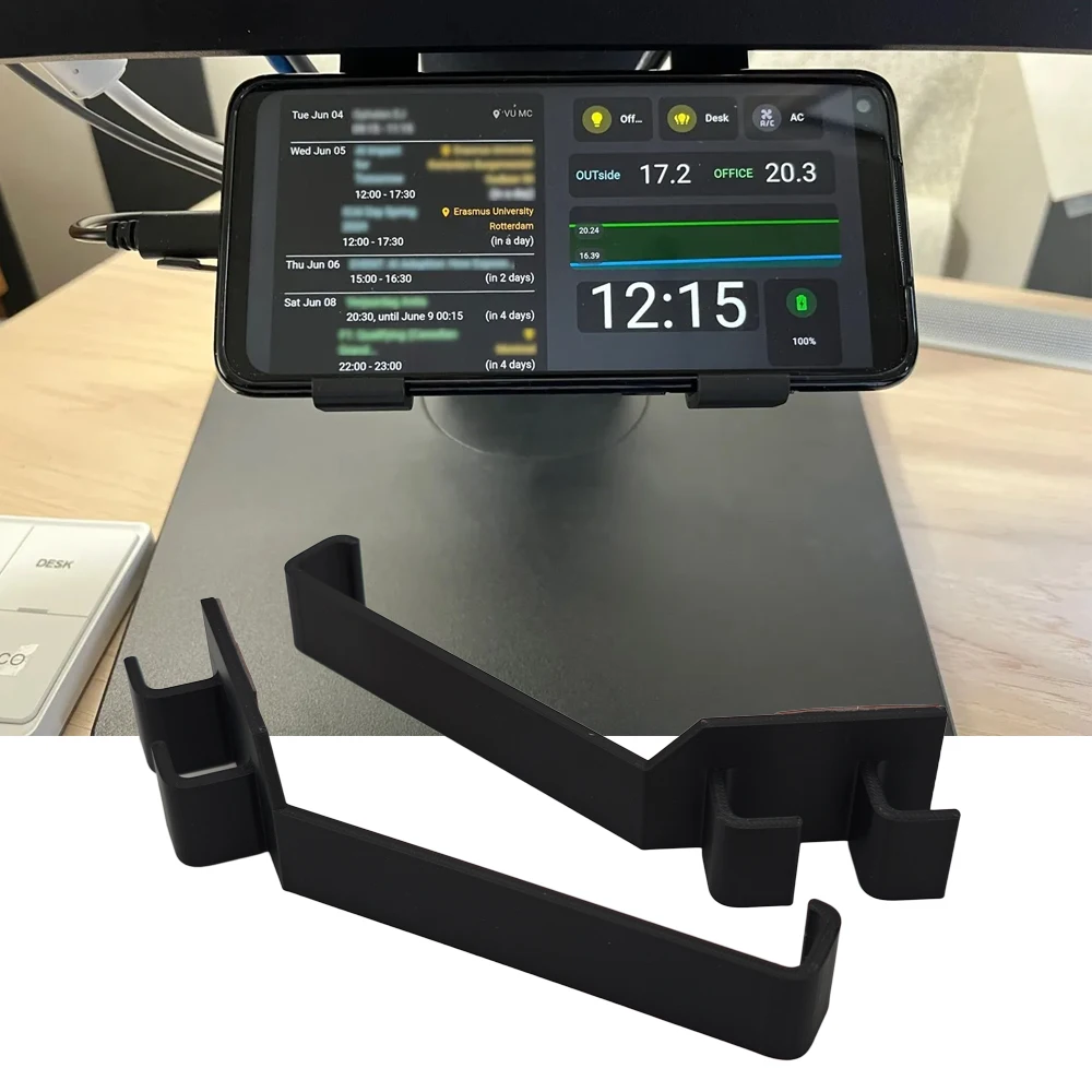 Cell Phone Holder In Front Of Computer Monitor Flexible And Adjustable Left And Right Widths
Cell Phone Holder In Front Of Computer Monitor Flexible And Adjustable Left And Right Widths