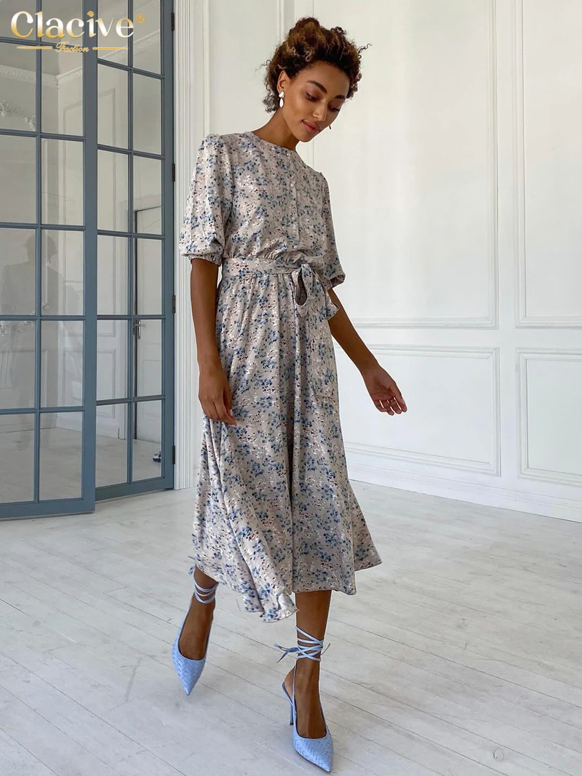 Clacive Fashion Loose Print Women's Dress 2026 Summer O-Neck Half Sleeve Midi Dresses Lady Elegant Classic Lace-Up Female Dress
Clacive Fashion Loose Print Women's Dress 2026 Summer O-Neck Half Sleeve Midi Dresses Lady Elegant Classic Lace-Up Female Dress