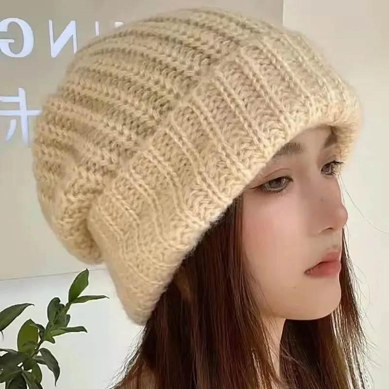 Winter Knitted Wool Hat Female Japanese Autumn and Winter Ear Protection Warm Pile of Hats Solid Color Caps for Women
Winter Knitted Wool Hat Female Japanese Autumn and Winter Ear Protection Warm Pile of Hats Solid Color Caps for Women