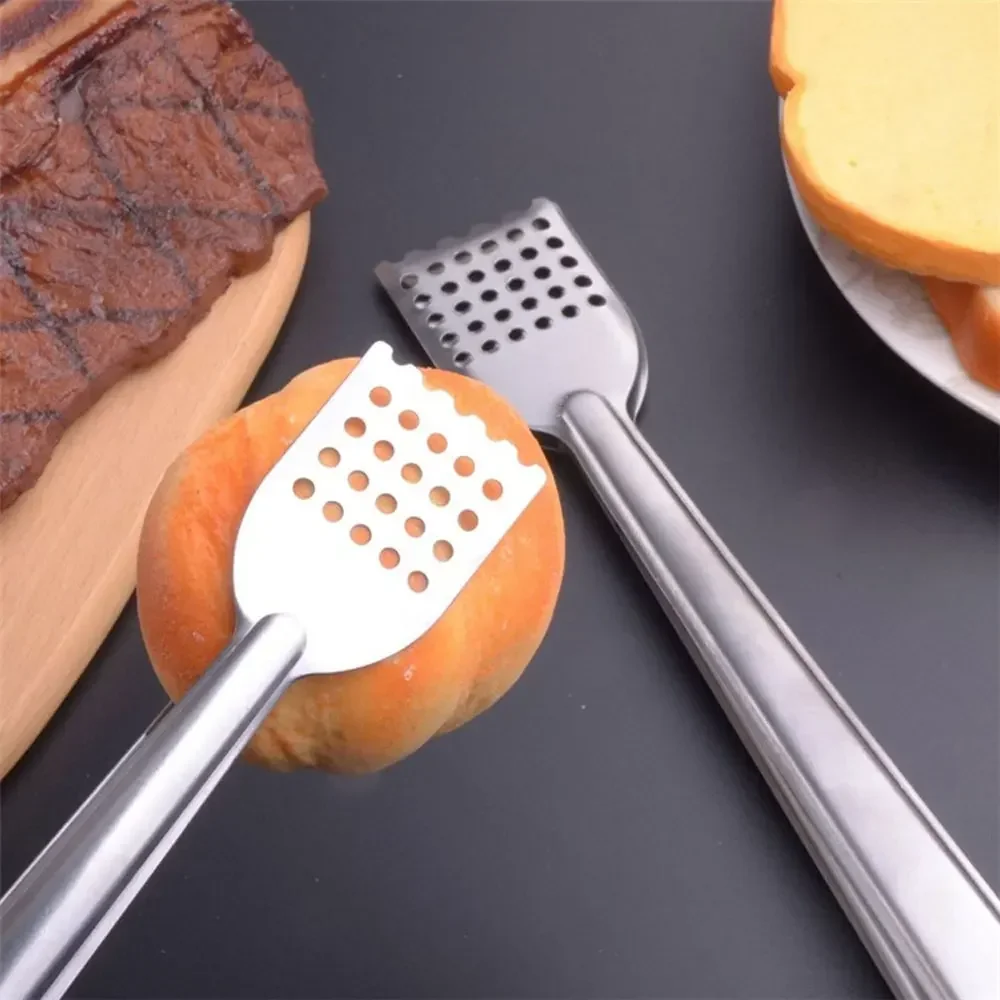 1Pc Silver Stainless Steel BBQ Food Tongs Anti Heat Bread Clip Pastry Clamp Barbecue Tongs Universal Cooking Kitchen Accessories
1Pc Silver Stainless Steel BBQ Food Tongs Anti Heat Bread Clip Pastry Clamp Barbecue Tongs Universal Cooking Kitchen Accessories