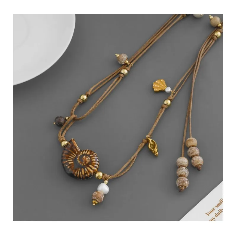 Home Conch Ceramic Bead Necklace Vintage Ethnic Style Light Luxury Niche Wearing Nautilus Waist Chain Necklace
Home Conch Ceramic Bead Necklace Vintage Ethnic Style Light Luxury Niche Wearing Nautilus Waist Chain Necklace