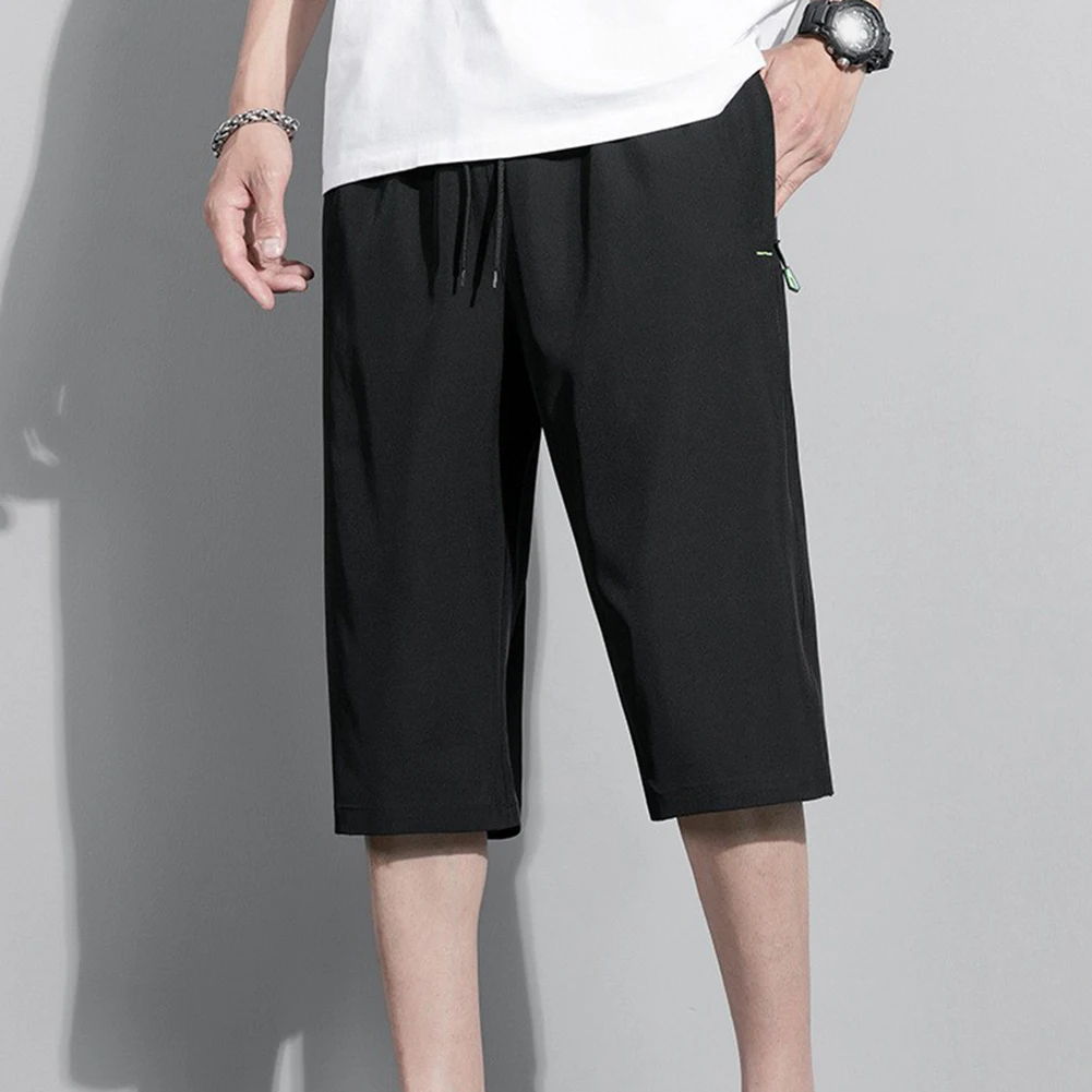 Breathable Ice Silk Men Short Pants Elastic Waist Drawstring Loose Fit Quick Dry Summer Sport Shorts for Casual Wear
Breathable Ice Silk Men Short Pants Elastic Waist Drawstring Loose Fit Quick Dry Summer Sport Shorts for Casual Wear