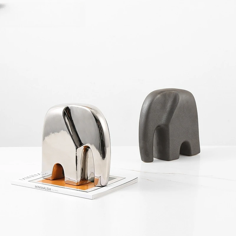 Creative minimalist abstract animal baby elephant ceramic light luxury ornaments, wine cabinet decoration desktop
Creative minimalist abstract animal baby elephant ceramic light luxury ornaments, wine cabinet decoration desktop