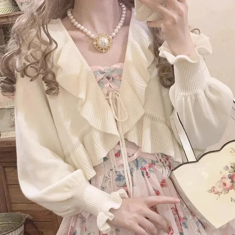 Японский милый вязаный кардиган, женский осенний укороченный свитер с оборками Kawaii на шнуровке, милые топы с эстетическим рукавом-фонариком в стиле Харадзюку
Японский милый вязаный кардиган, женский осенний укороченный свитер с оборками Kawaii на шнуровке, милые топы с эстетическим рукавом-фонариком в стиле Харадзюку