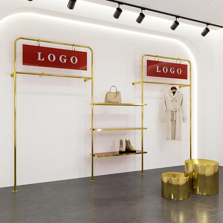 Custom Logo Wall Mounted Garment Clothing Display Rack Metal Boutique Clothes Rack Display Gold Stainless Steel Clothes Stand
Custom Logo Wall Mounted Garment Clothing Display Rack Metal Boutique Clothes Rack Display Gold Stainless Steel Clothes Stand