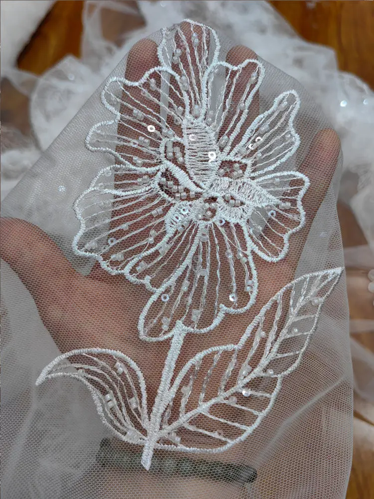 Premium silver flower embroidered lace fabric for wedding dress DIY clothing accessory high quality lace for fashion design
Premium silver flower embroidered lace fabric for wedding dress DIY clothing accessory high quality lace for fashion design