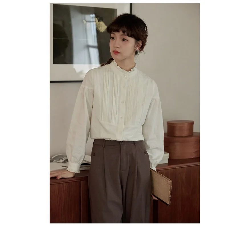 Women's French Retro Stand-up Collar Long-sleeved Commuter Shirt Top
Women's French Retro Stand-up Collar Long-sleeved Commuter Shirt Top