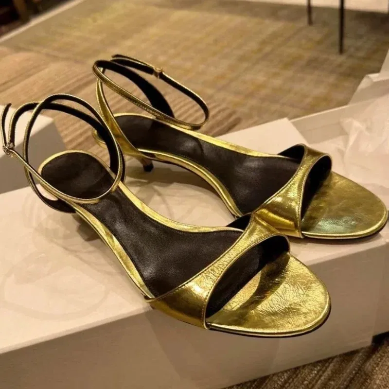 Золотые лаконичные дизайнерские босоножки на каблуке, женские элегантные женские туфли на каблуке с ремешком на щиколотке, черные модные женские туфли на каблуке с открытым носком
Золотые лаконичные дизайнерские босоножки на каблуке, женские элегантные женские туфли на каблуке с ремешком на щиколотке, черные модные женские туфли на каблуке с открытым носком